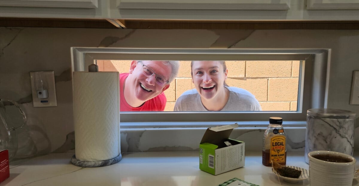 steve bull from salt and lavender photographed in a window with natasha bull