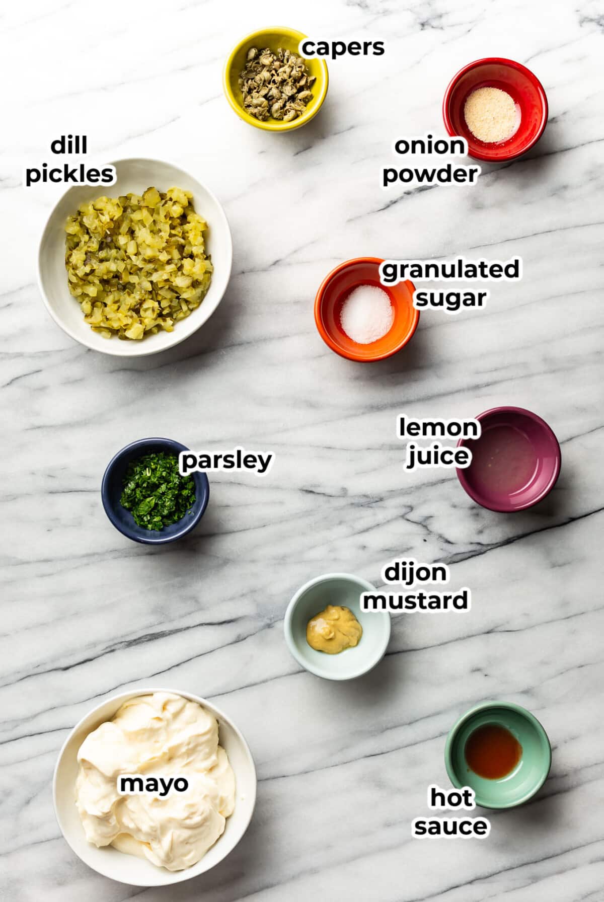 ingredients for homemade tartar sauce in prep bowls