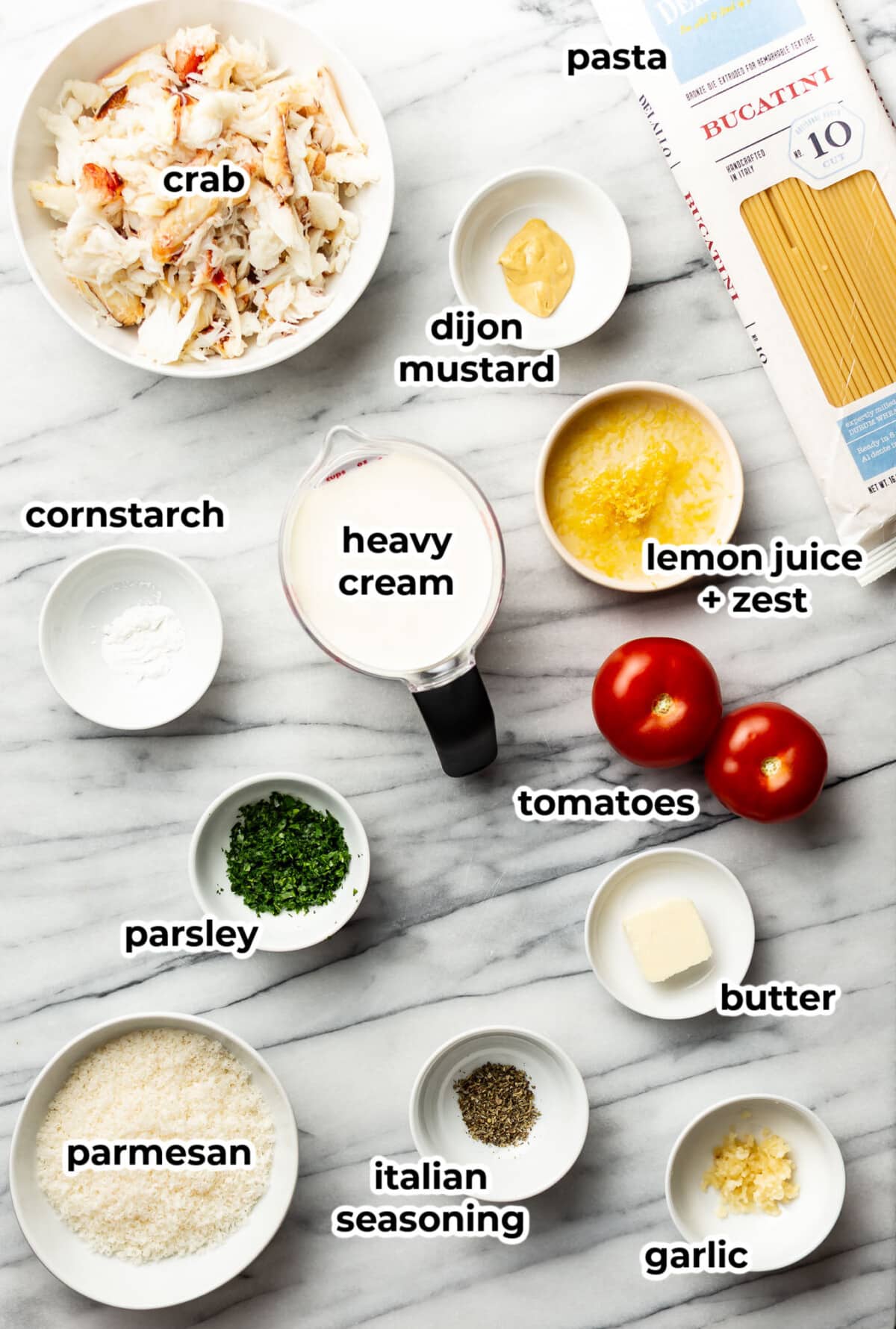ingredients for crab pasta in prep bowls