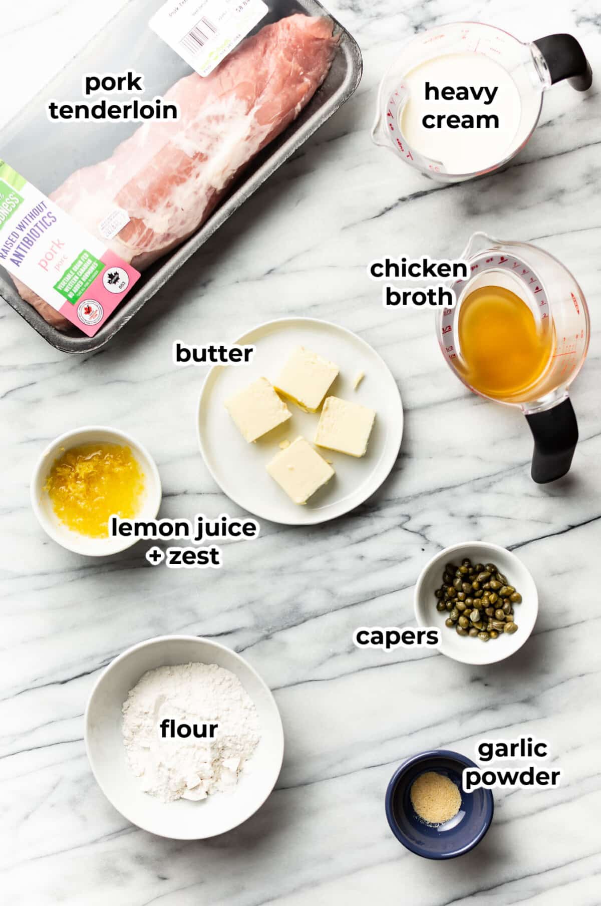 ingredients for pork tenderloin piccata in prep bowls