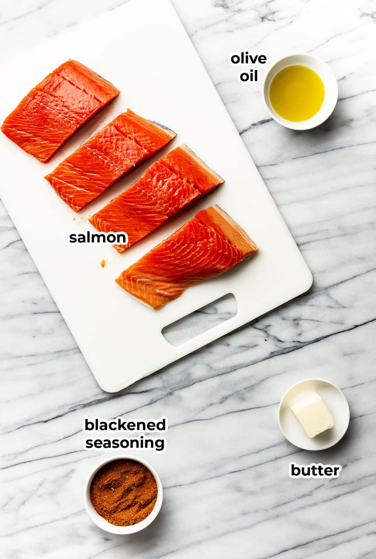 ingredients for blackened salmon in prep bowls