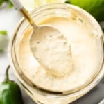 a mason jar with homemade jalapeno ranch dressing