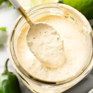 a mason jar with homemade jalapeno ranch dressing