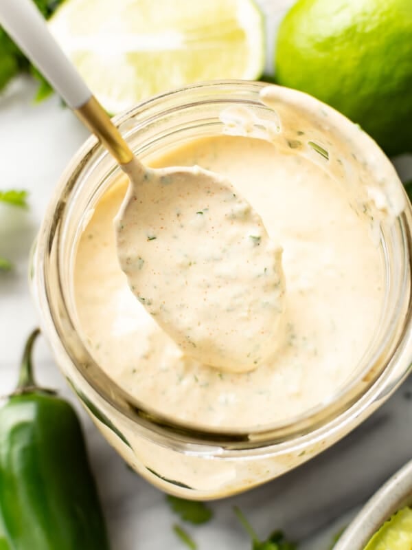 a mason jar with homemade jalapeno ranch dressing