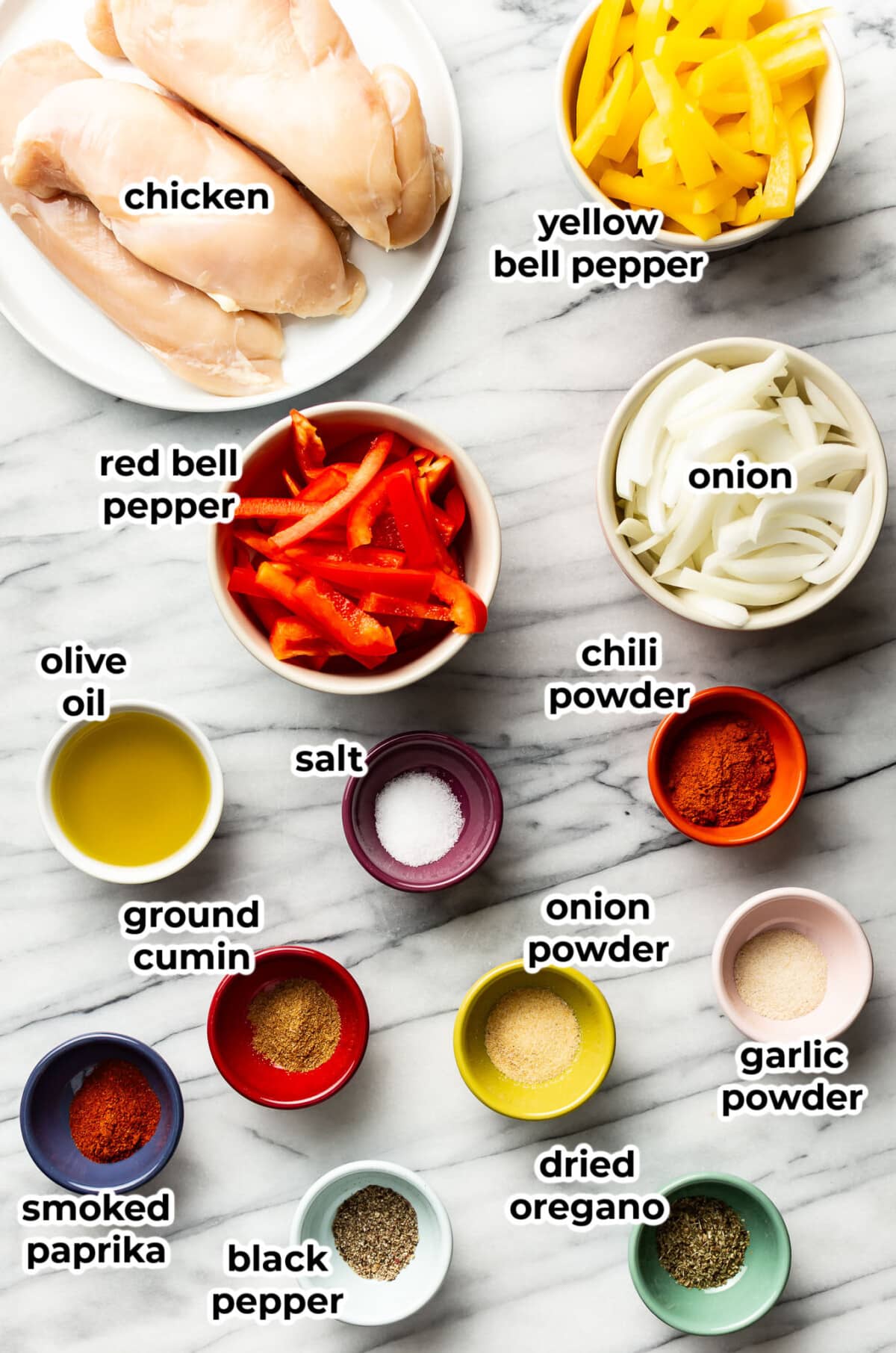ingredients for air fryer chicken fajitas in prep bowls