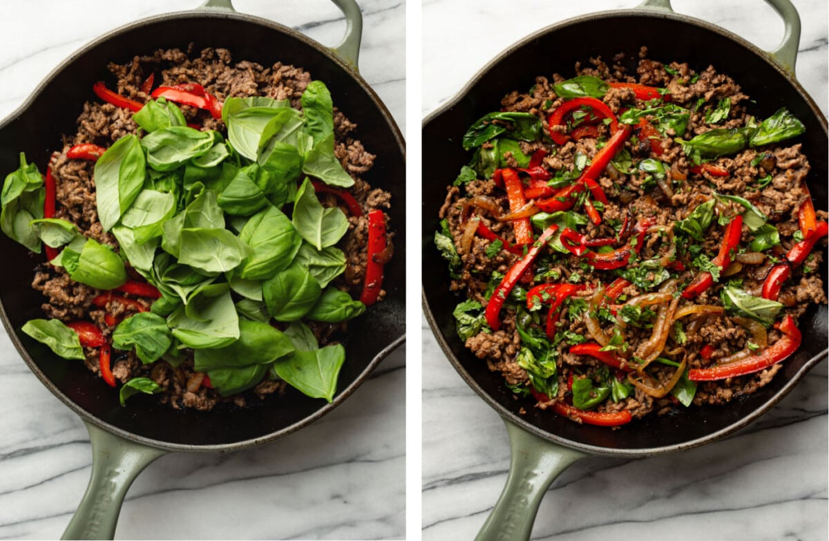 adding fresh basil to a skillet for thai basil beef