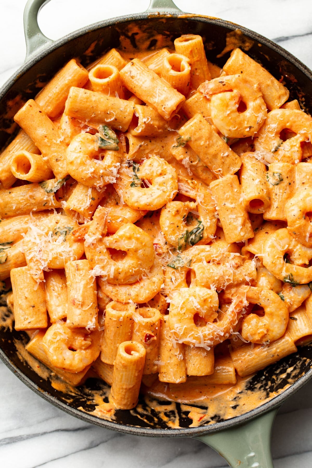 a skillet with spicy shrimp rigatoni